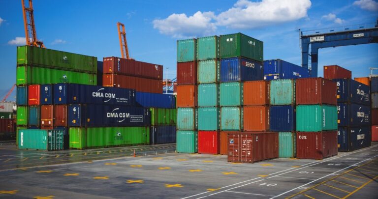 Stacked shipping containers in a container yard